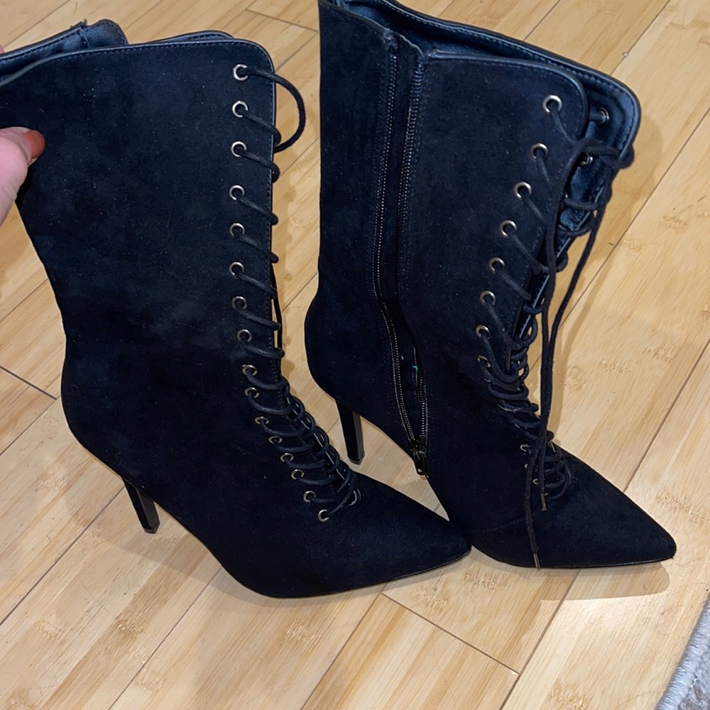 Black pointed toe heel boots